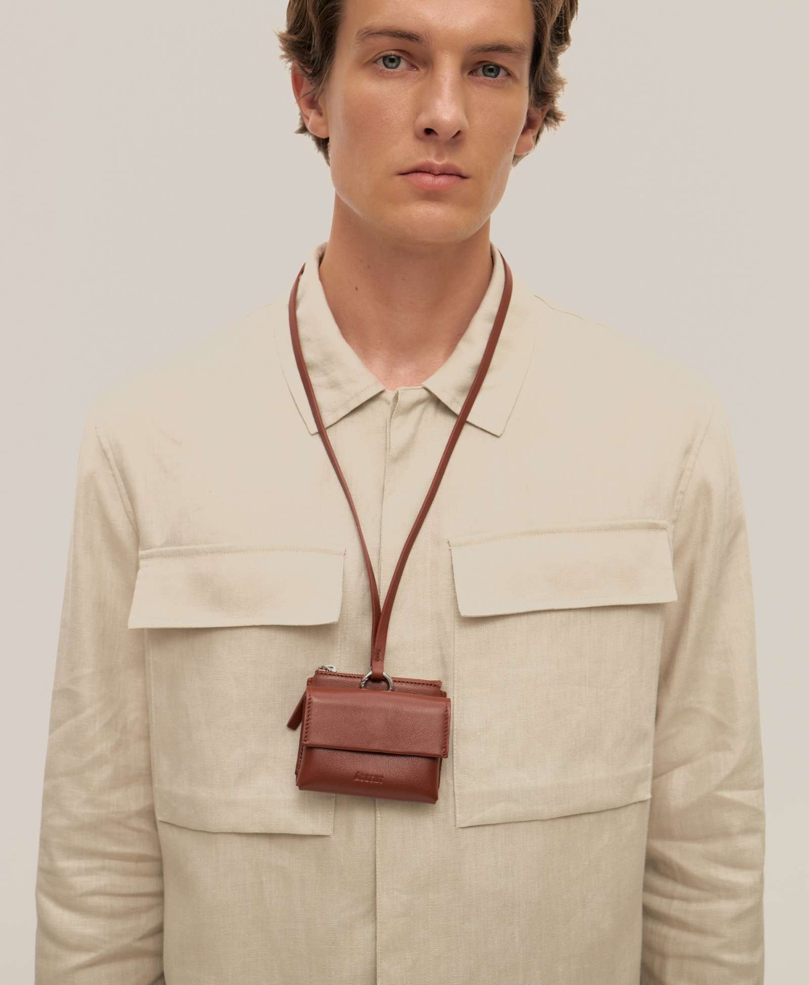 Мини-портмоне на длинном шнуре. Вид 1